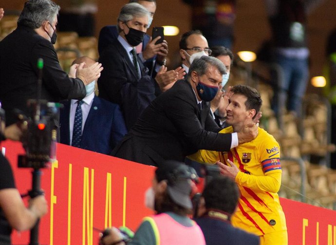 Joan Laporta, President of FC Barcelona and Lionel Messi of Barcelona during Copa Del Rey Final match between Athletic Club and Futbol Club Barcelona at Estadio de La Cartuja on April 17, 2021 in Seville, Spain.