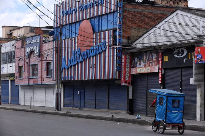 16 April 2021, Colombia, Bogota: Stores are seen closed in the commercial area of San Andresito during the fourth day of strict quarantine and locdown, imposed to curb the spread of Coronavirus pandemic. Photo: Camila Díaz/colprensa/dpa