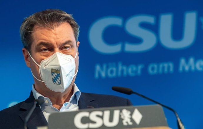 20 April 2021, Bavaria, Munich: Bavarian Minister President and leader of the Christian Social Union (CSU) Markus Soeder arrives to a press conference to deliver a statement. Soeder has conceded the race to lead Germany's conservatives into September el