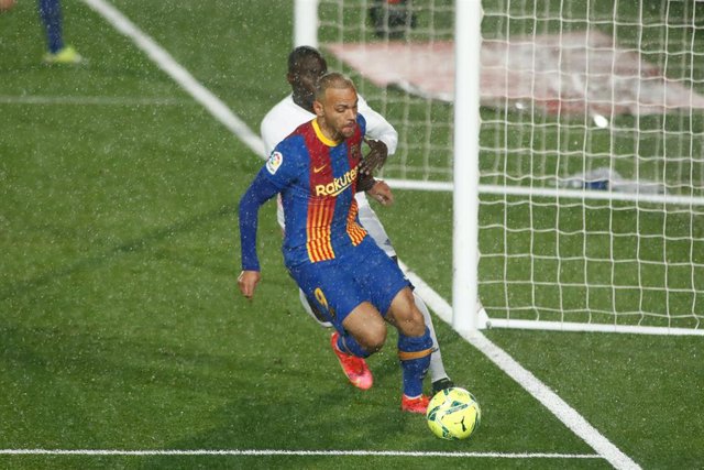 Ferland Mendy of Real Madrid and Martin Braithwaite of FC Barcelona in action during the spanish league, La Liga, football match played between Real Madrid and FC Barcelona at Alfredo Di Stefano stadium on April 10, 2021 in Madrid, Spain.