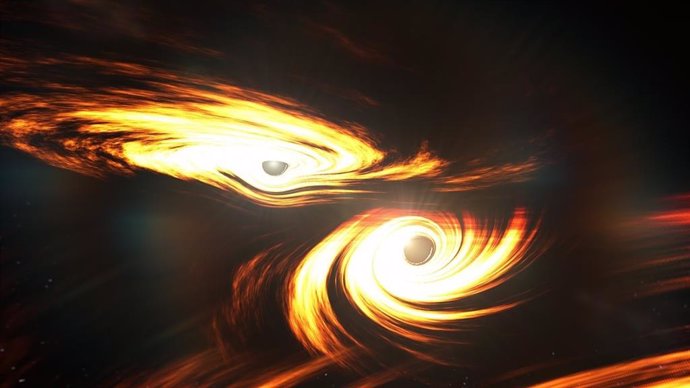 Artist's impression of binary black holes about to collide.