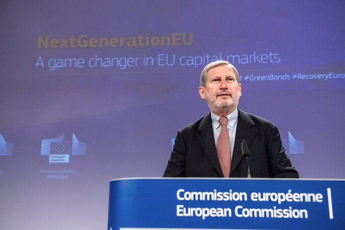 HANDOUT - 14 April 2021, Belgium, Brussels: Johannes Hahn, European Commissioner for Budget and Administration, speaks during a press conference on NextGenerationEU - Funding strategy to finance the Recovery Plan for Europe. Photo: Lukasz Kobus/European