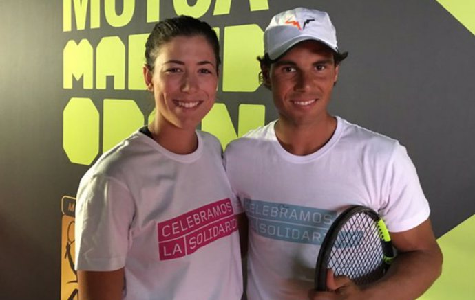 Archivo - Los tenistas Garbiñe Muguruza y Rafa Nadal en el Mutua Madrid Open