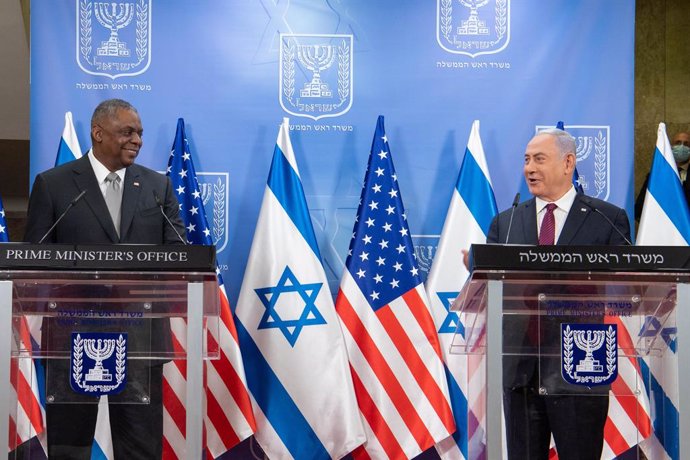 HANDOUT - 12 April 2021, Israel, Jerusalem: US Defence Secretary Lloyd Austin (L) and Israeli Prime Minister Benjamin Netanyahu hold a joint press conference following their meeting at the prime minister's office. Photo: Jack Sanders/US Department of De
