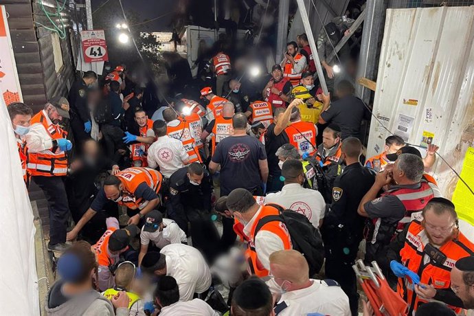 HANDOUT - 30 April 2021, Israel, Mount Meron: A handout image provided by the Israeli Emergency Medical Service United Hatzalah shows first responders working at the Jewish Orthodox pilgrimage site of Mount Meron, where dozens of worshippers were killed