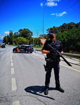 Archivo - Un agente de la Policía Nacional en una fotografía de archivo