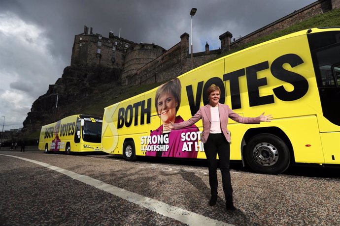 01 May 2021, United Kingdom, Edinburgh: Scotland's First Minister and leader of the Scottish National Party (SNP), Nicola Sturgeon, stands in front of her campaign buses while campaigning for the Scottish Parliamentary election. Photo: Russell Cheyne/PA