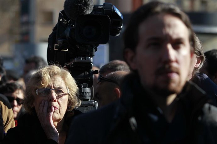 Archivo - La exalcaldesa de Madrid, Manuela Carmena y el secretario general de Podemos, Pablo Iglesias en un acto por el 11M