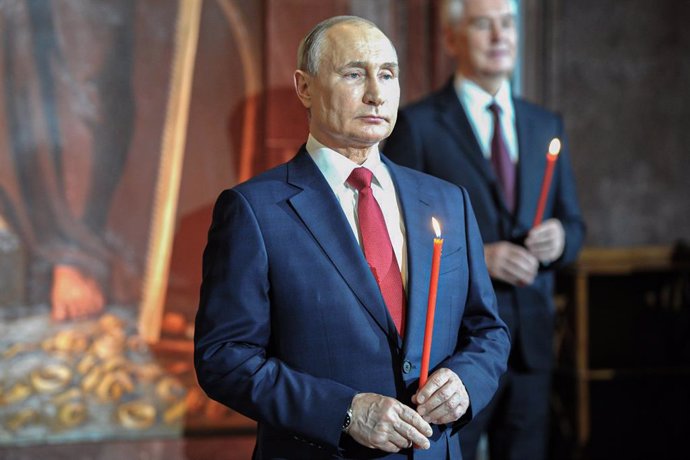 HANDOUT - 02 May 2021, Russia, Moscow: Russian President Vladimir Putin attends a service at the Christ the Saviour Eastern Orthodox Cathedral on the occasion of the Orthodox Easter. Photo: -/Kremlin/dpa - ATTENTION: editorial use only and only if the c