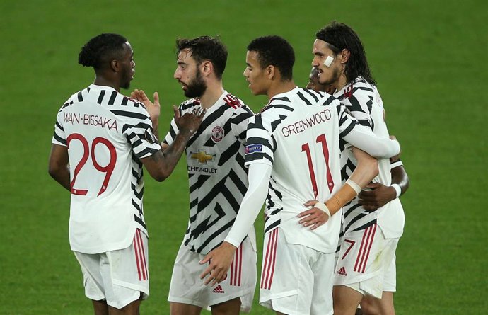Jugadores del Manchester United celebran uno de sus goles ante la Roma