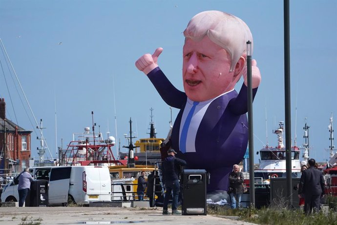 07 May 2021, United Kingdom, Hartlepool: A 30 ft (9.1 meters) inflatable ballon of the UK Prime Minister Boris Johnson can be seen at Jacksons Wharf following Conservative's Jill Mortimer victory in the Hartlepool parliamentary by-election. Photo: Owen 