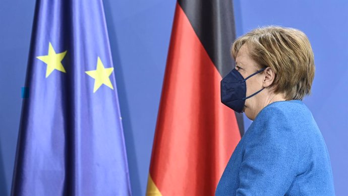 08 May 2021, Berlin: German Chancellor Angela Merkel leaves the press conference after a statement on the informal EU summit and the EU-China summit . Photo: John Macdougall/AFP-Pool/dpa