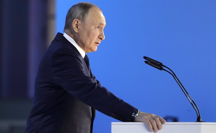 HANDOUT - 21 April 2021, Russia, Moscow: Russian Presidtnt Vladimir Putin delivers his annual State of the Nation address at the Moscow Manege. Photo: -/Kremlin /dpa - ATTENTION: editorial use only and only if the credit mentioned above is referenced in