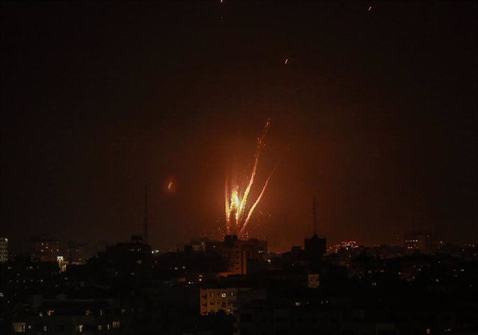 10 May 2021, Palestinian Territories, Gaza City: Rockets are fired by the Palestinian Islamist movement Hamas from Gaza towards Israel. The Islamist Hamas movement that rules Gaza said Monday it launched several rockets at Israel in retaliation for Isra