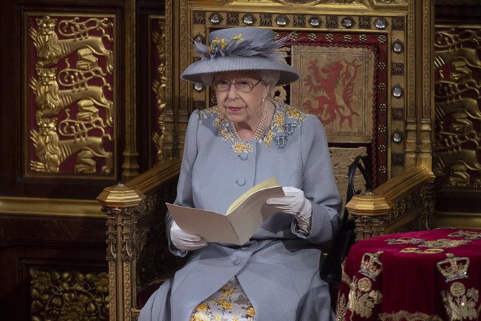 11 May 2021, United Kingdom, London: Queen Elizabeth II delivers what is known as the "Queen's Speech" from the throne in the House of Lords at the Palace of Westminster, as she outlines the government's legislative programme for the coming session duri