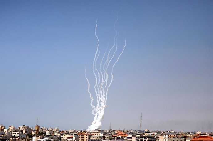11 May 2021, Palestinian Territories, Gaza City: Rockets are fired by the Palestinian Islamist movement Hamas from Gaza City towards Israel. Rocket attacks on Israel from Palestinian militants in the Gaza Strip extended northwards on Tuesday, as Israel 