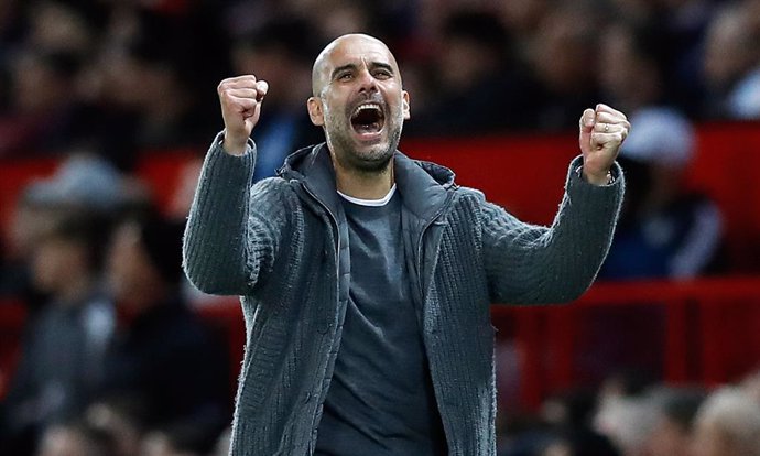 Archivo - 24 April 2019, England, Manchester: Manchester City's manager Pep Guardiola celebrates after Leroy Sane scored his side's second goal during the English Premier League soccer match between Manchester United and Manchester City at Old Trafford.