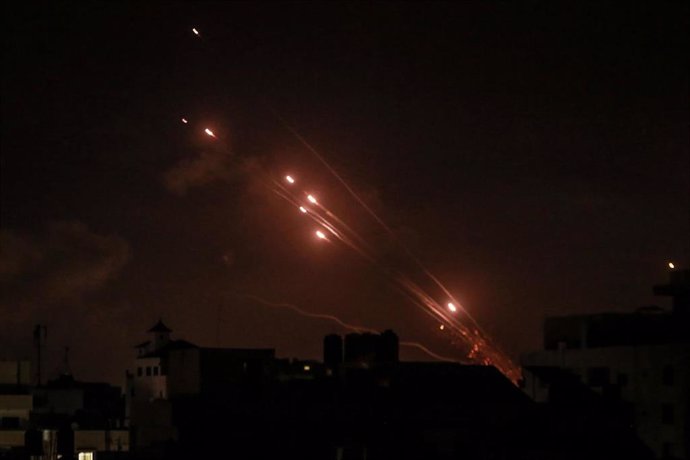 12 May 2021, Palestinian Territories, Gaza City: Rockets are fired by the Palestinian Islamist movement Hamas from Gaza City towards Israel, amid the escalating flare-up of Israeli-Palestinian violence. Photo: Mohammed Talatene/dpa