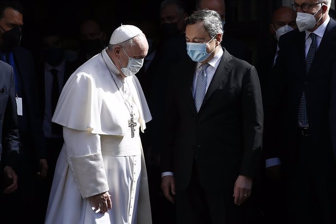 14 May 2021, Italy, Rome: Pope Francis (L) leaves at the Conciliazione Auditorium after attending a conference on the country's demographic crisis, with Italian Prime Minister Mario Draghi. Photo: Cecilia Fabiano/LaPresse via ZUMA Press/dpa
