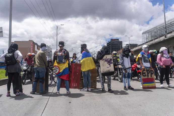15 May 2021, Colombia, Bogota: Protesters take part in a march during the national strike against the government of Colombian President Ivan Duque Marquez. Photo: Daniel Garzon Herazo/ZUMA Wire/dpa