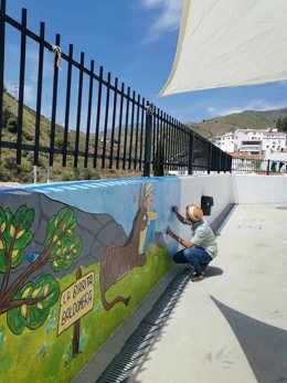 Dibujo de la burrita Baldomera en un mural del colegio de El Borge