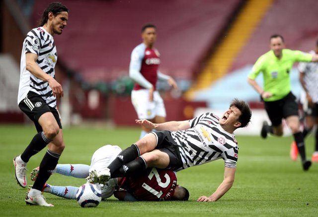 09 May 2021, United Kingdom, Birmingham: Manchester United's Harry Maguire and Aston Villa's Anwar El Ghazi battle for the ball during the English Premier League soccer match between Aston Villa and Manchester United at Villa Park. Photo: Nick Potts/PA 