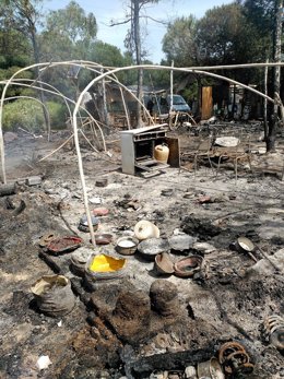 Archivo - Imagen de archivo de un incendio en un asentamiento de Lucena del Puerto (Huelva).