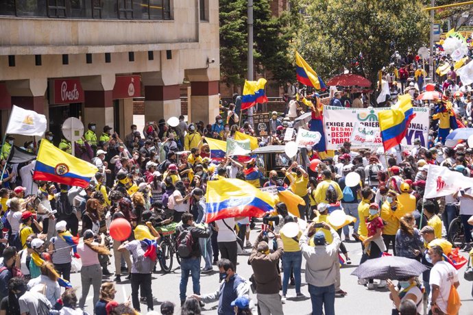 19 May 2021, Colombia, Bogota: Demonstrators take part in a protest against the government of President Ivan Duque Marquez. Photo: Daniel Garzon Herazo/ZUMA Wire/dpa