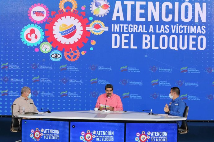 HANDOUT - 14 May 2021, Venezuela, Caracas: Venezuelan President Nicolas Maduro (M) speaks during a press conference on an aid plan for "victims of the blockade against the Venezuelan people." Photo: ---/Prensa Miraflores/dpa - ATTENTION: editorial use o