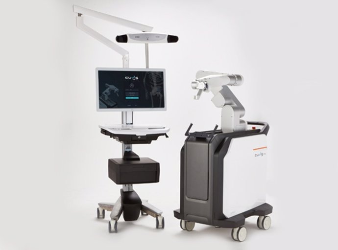 The spinal surgery robot CUVIS-spine(Left - Main Console, Right - Robotic Arm)
