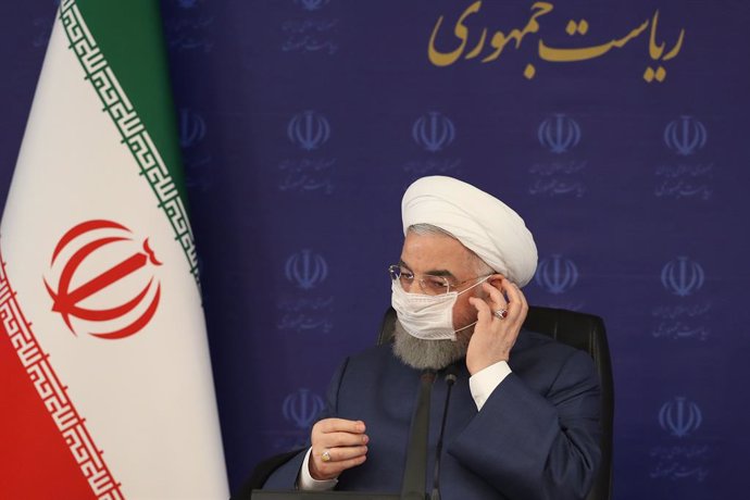 Archivo - El presidente iraní, Hasán Rohani, con mascarilla