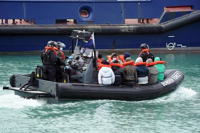 29 May 2021, United Kingdom, Dover: A group of people thought to be migrants are brought in to Dover, following a small boat incident in the English Channel earlier this morning. Photo: Andrew Matthews/PA Wire/dpa