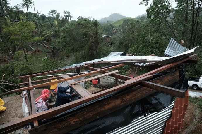 Archivo - 17 November 2020, Nicaragua, Siuna: A person inspects a house that was severely damaged after the devastating hurricane Iota made landfall in Nicaragua. Photo: Carlos Herrera/dpa