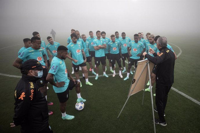 HANDOUT - 30 May 2021, Brazil, Teresopolis: Brazil head coach Tite leads a training session for the Brazil National Soccer Team at the Granja Comary sports Complex where the team begins preparing for the upcoming 2021 Copa America which will take place 