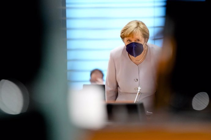 09 June 2021, Berlin: German Chancellor Angela Merkel arrives to attend the weekly cabinet meeting at the Chancellery. Photo: Markus Schreiber/AP POOL/dpa
