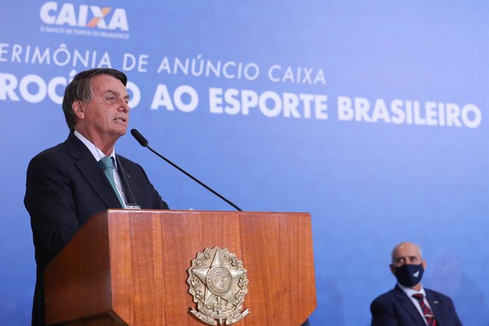 HANDOUT - 01 June 2021, Brazil, Brasilia: Brazilian President Jair Bolsonaro speaks during a ceremony of the state bank sponsoring Brazilian athletics as he also confirmed that his country will host the 2021 Copa America at the Planalto presidential pal