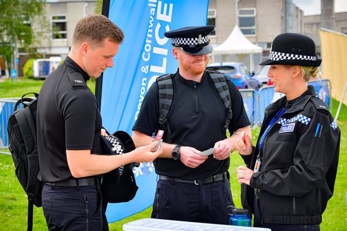 07 June 2021, United Kingdom, Devon: Police officers from external forces across the UK arrive and begin to be processed at Devon and Cornwall Police's tented briefing centre, before being deployed on policing duties for the G7 summit, which will be hel