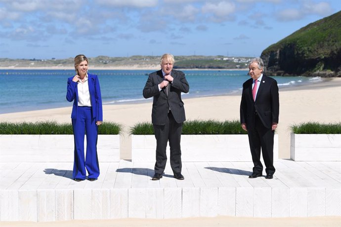 12 June 2021, United Kingdom, Carbis Bay: UK Prime Minister Boris Johnson and his wife Carrie, greet Secretary-General of the United Nations Antonio Guterres during an official welcome at the G7 summit, running from 11 to 13 June in Cornwall. Photo: Ste
