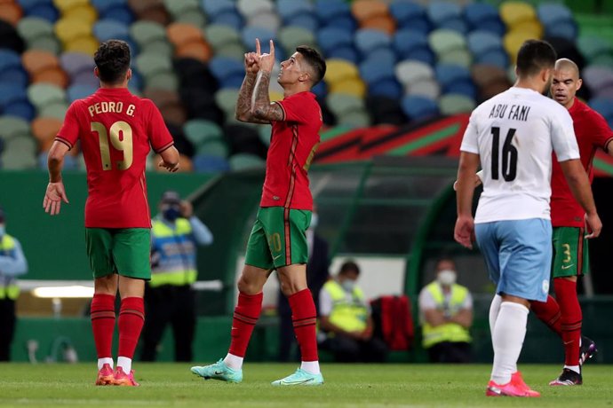 09 June 2021, Portugal, Lisbon: Portugal's Joao Cancelo celebrates scoring during the International Friendly soccer match between Portugal and Israel, at the Jose Alvalade stadium. Photo: Pedro Fiuza/ZUMA Wire/dpa