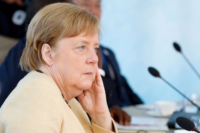 13 June 2021, United Kingdom, Carbis Bay: German Chancellor Angela Merkel attends a plenary session as part of the G7 Summit. Photo: Phil Noble/PA Wire/dpa