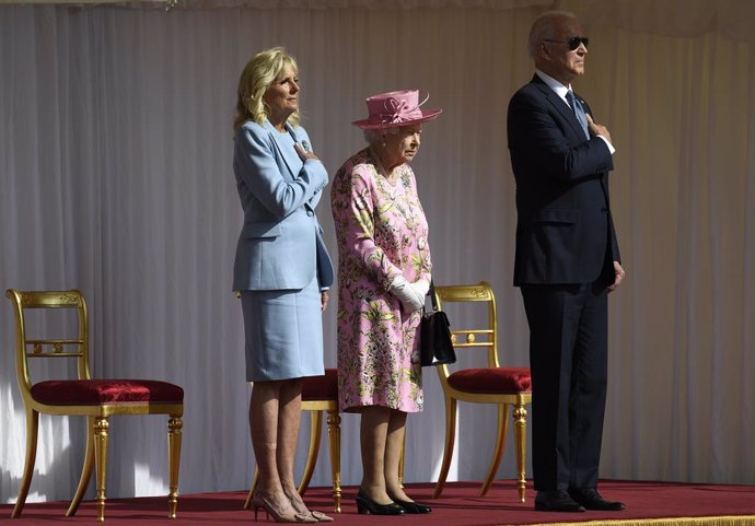 13 June 2021, United Kingdom, Windsor: Queen Elizabeth II (C) receives US President Joe Biden (R) and First Lady Jill Biden during their visit to Windsor Castle. Photo: Matt Dunham/PA Wire/dpa