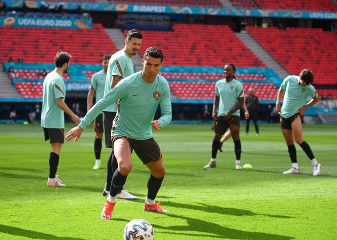 14 June 2021, Hungary, Budapest: Portugal's Cristiano Ronaldo takes part in a training session for the team at the Puskas Arena ahead of Tuesday's UEFAEURO2020 Group F soccer match against Hungary. Photo: Robert Michael/dpa-Zentralbild/dpa