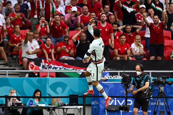 15 June 2021, Hungary, Budapest: Portugal's Cristiano Ronaldo celebrates scoring his side's second goal during the UEFAEURO2020 Group F soccer match between Hungary and Portugal at the Puskas Arena. Photo: Robert Michael/dpa-Zentralbild/dpa