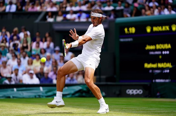 Archivo - 08 July 2019, England, London: Spanish tennis player Rafael Nadal in action against Portugal's Joao Sousa during their men's singles round of 16 match on day seven of the 2019 Wimbledon Grand Slam tennis tournament at the All England Lawn Tenn