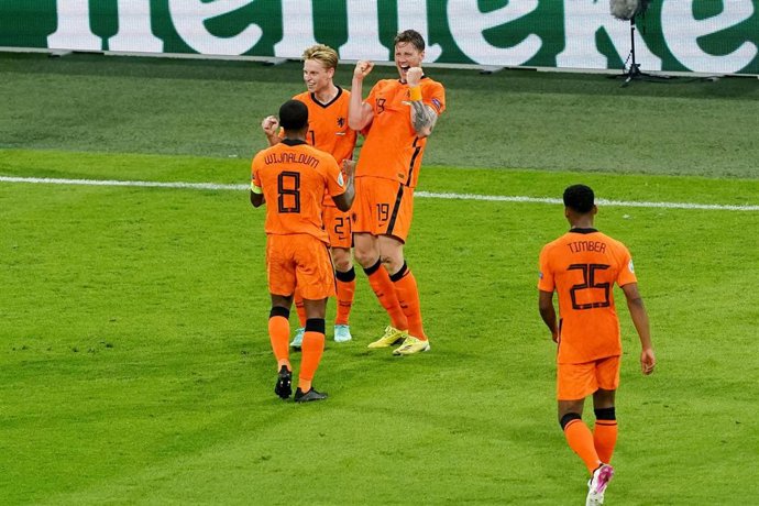 Wout Weghorst of the Netherlands celebrates with Frenkie de Jong and Georginio Wijnaldum of the Netherlands after scoring his sides second goal during the UEFA Euro 2020, Group C football match between Netherlands and Ukraine