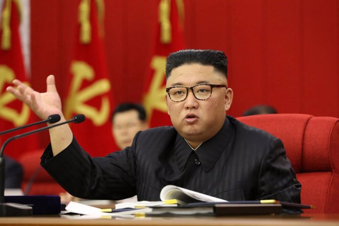 HANDOUT - 15 June 2021, North Korea, Pyongyang: A picture provided by the North Korean state news agency (KCNA) on 16 June 2021, shows North Korean Leader Kim Jong-un speaking during the third plenary meeting of the eighth Central Committee of North Kor