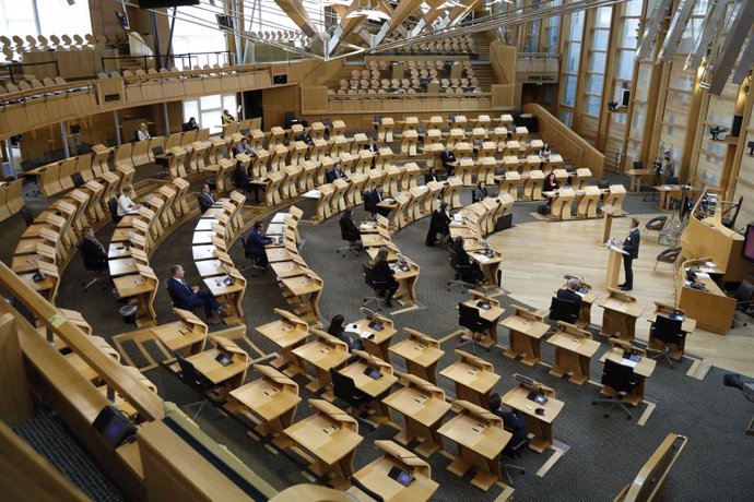 Archivo - HANDOUT - 10 May 2021, United Kingdom, Edinburgh: Newly-elected members of Parliament attend the Scottish Parliament session following the results of the election. Representatives who have been elected for the first time, or who are returning 