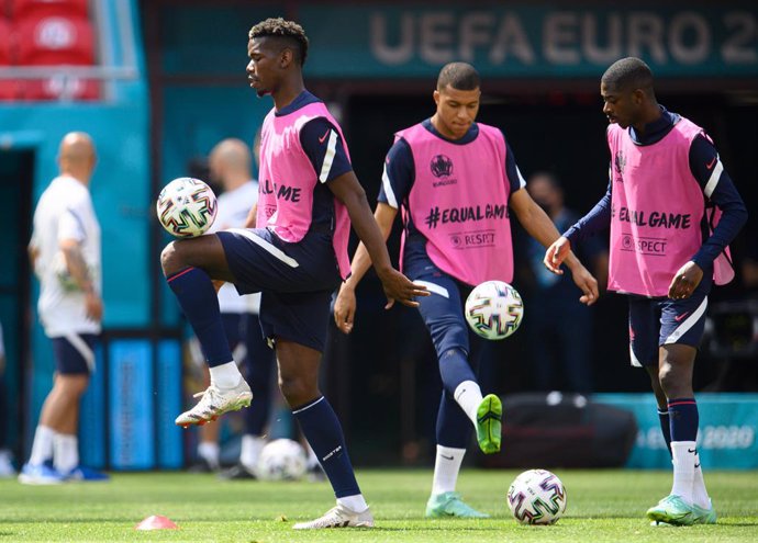 18 June 2021, Hungary, Budapest: (L-R) France's Paul Pogba, Kylian Mbappe and Ousmane Dembele take part in a training session for the team at the Puskas Arena ahead of Saturday's UEFA EURO 2020 Group F soccer match against Hungary. Photo: Robert Michael