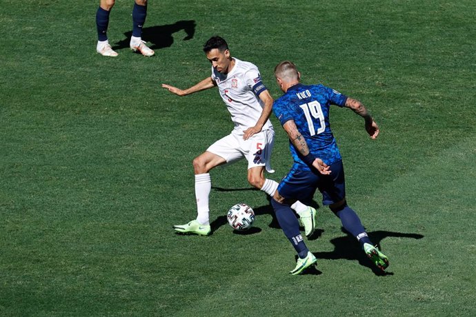 Juraj Kucka of Slovakia and Sergio Busquets of Spain in action during the UEFA EURO 2020 Group E football match between Slovakia and Spain at La Cartuja stadium on June 23, 2021 in Seville, Spain.