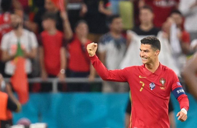 23 June 2021, Hungary, Budapest: Portugal's Cristiano Ronaldo celebrates scoring his side's first goal during the UEFA EURO 2020 Group F soccer match between Portugal and France at the Puskas Arena. Photo: Robert Michael/dpa-Zentralbild/dpa